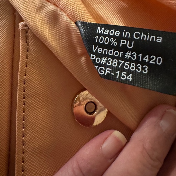 GUESS Peach Saffiano Crossbody Top Handle Bag w/ Bow Tassel & Long Strap - Picture 15 of 16